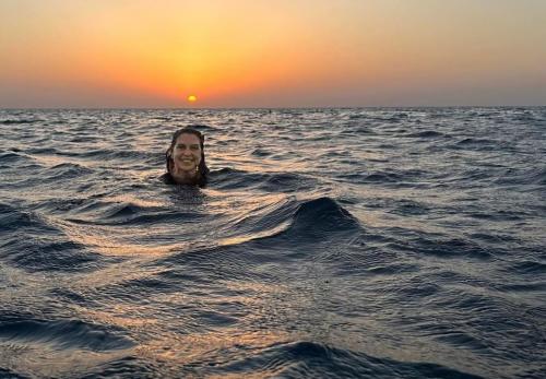 Swimming at sunset