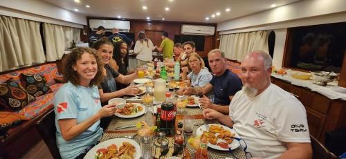 Group dining on a Live abord 