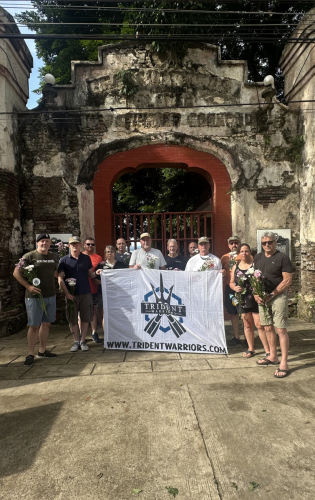 Trident Warriors and their www.tridentwarriors.com flag during their tour in the Philippines while on a scuba diving trip in 2025