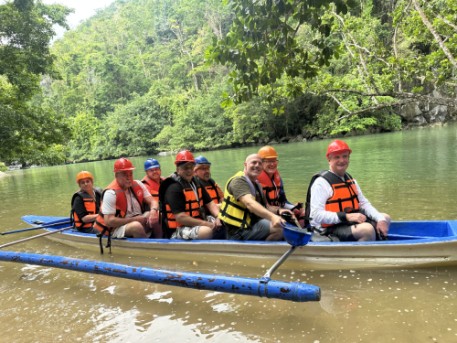 Trident Warriors on a small guide boat enjoying the sites while in the Philippines for their 2025 scuba diving trip