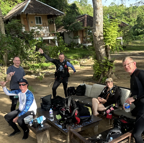 A group of Trident Warriors scuba divers checking their gear to make sure they are ready for the net dive during the 2025 trip to the Philippines