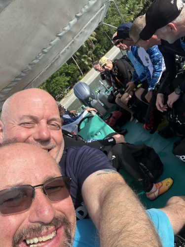 Trident Warriors founder and the other scuba divers on the boat and headed to the next dive location in the Philippines in 2025