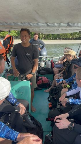 Trident Warriors on the boat in 2025 and headed to their next scuba diving location during the trip to the Philippines