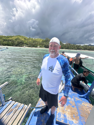 A Trident Warrior scuba diver getting ready for the next set of diving while in the Philippines, 2025.