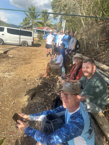 The 2025 Trident Warriors group relaxing in the shade while waiting for the next scuba dive