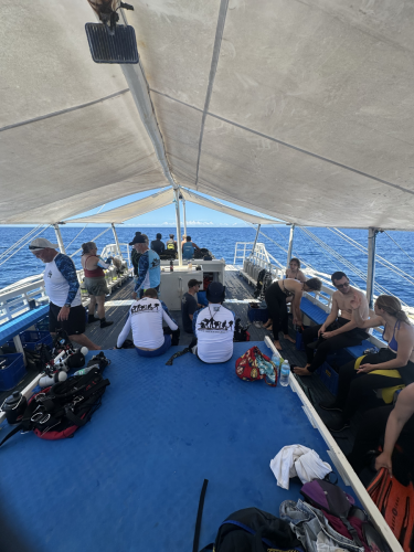 On the boat in between dives while Evolution Dive Resort takes Trident Warriors to the next scuba site
